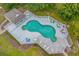 Community pool with surrounding lounge chairs and patio at 1100 Possum Trot Rd. # F-213, North Myrtle Beach, SC 29582