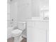 Clean bathroom with white vanity, toilet, and bathtub at 1127 Nw Rosefield Way, Calabash, NC 28467