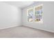 Spacious bedroom with neutral walls and carpeting at 1127 Nw Rosefield Way, Calabash, NC 28467