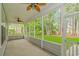 Spacious screened porch overlooking a lush green backyard at 1226 Foxtail Dr., Longs, SC 29568