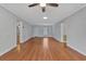 Spacious living room featuring hardwood floors and neutral walls at 1305 Conifer Ct., Murrells Inlet, SC 29576