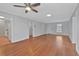 Bright living room with hardwood floors and neutral walls, offering an open floor plan at 1305 Conifer Ct., Murrells Inlet, SC 29576