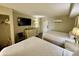 Bedroom with two double beds, dresser, and closet at 201 S Ocean Blvd. # 714, Myrtle Beach, SC 29577