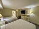 Bedroom with two double beds and dresser at 201 S Ocean Blvd. # 714, Myrtle Beach, SC 29577