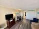 Living room with dining area, seating and kitchen access at 201 S Ocean Blvd. # 714, Myrtle Beach, SC 29577