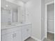 Bathroom with double vanity and white cabinets at 2100 Copper Creek Ct., Longs, SC 29568