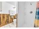 Simple bathroom with shower stall and wood-paneled walls at 310 34Th Ave. N, North Myrtle Beach, SC 29582