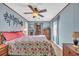 Spacious Primary bedroom with a king-size bed and ample natural light at 310 34Th Ave. N, North Myrtle Beach, SC 29582