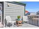 Relaxing deck overlooking the water with white wicker chairs at 310 34Th Ave. N, North Myrtle Beach, SC 29582