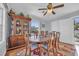 Dining room with a wooden table, chairs, and a china cabinet at 310 34Th Ave. N, North Myrtle Beach, SC 29582