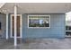 Exterior view of the home with a covered patio at 310 34Th Ave. N, North Myrtle Beach, SC 29582