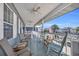 Relaxing porch with rocking chairs overlooking the street at 310 34Th Ave. N, North Myrtle Beach, SC 29582