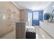 Luxurious bathroom with double sinks, large shower, and marble vanity at 338 Harbour View Dr., Myrtle Beach, SC 29579