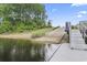 Convenient boat ramp with steps and adjacent sandy beach at 338 Harbour View Dr., Myrtle Beach, SC 29579