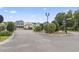 Gated community entrance with landscaping and streetlights at 338 Harbour View Dr., Myrtle Beach, SC 29579