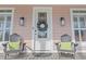 Inviting front entrance with decorative wreath and comfortable seating at 338 Harbour View Dr., Myrtle Beach, SC 29579