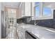 Modern kitchen with white cabinets, sleek countertops, and a stylish sink at 338 Harbour View Dr., Myrtle Beach, SC 29579