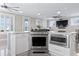 Modern kitchen with stainless steel appliances and a large island at 338 Harbour View Dr., Myrtle Beach, SC 29579