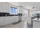 Modern kitchen with white cabinets, farmhouse sink, and stainless steel appliances at 338 Harbour View Dr., Myrtle Beach, SC 29579