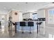 Modern kitchen with a large island, white cabinets, and stainless steel appliances at 338 Harbour View Dr., Myrtle Beach, SC 29579