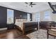 Large main bedroom with dark wood flooring and plantation shutters at 338 Harbour View Dr., Myrtle Beach, SC 29579