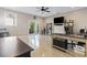 Spacious home office with large desk, sliding door to patio, and hardwood floors at 338 Harbour View Dr., Myrtle Beach, SC 29579