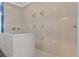 Large walk-in shower with multiple shower heads and marble bench at 338 Harbour View Dr., Myrtle Beach, SC 29579