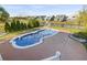 Relaxing freeform swimming pool in a beautifully landscaped backyard at 338 Harbour View Dr., Myrtle Beach, SC 29579