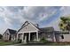 Exterior view of community clubhouse with landscaping at 339 Broughton Dr., Myrtle Beach, SC 29579