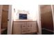 Bathroom with double vanity and walk-in closet at 425 Spauldingwood Rd., Little River, SC 29566