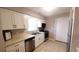Modern kitchen with white cabinets and stainless steel appliances at 425 Spauldingwood Rd., Little River, SC 29566