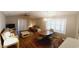 Living room with wood floors, seating area, and dining table at 425 Spauldingwood Rd., Little River, SC 29566