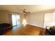 Main bedroom with patio access and ceiling fan at 425 Spauldingwood Rd., Little River, SC 29566