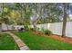 Landscaped backyard with stone path and lush greenery at 437 N Boyle Dr., Pawleys Island, SC 29585