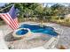 Inviting pool and hot tub area with flagstone patio at 437 N Boyle Dr., Pawleys Island, SC 29585