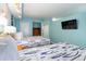 Bedroom with two double beds and a wall-mounted TV at 4800 Ocean Blvd. S # 915, North Myrtle Beach, SC 29582