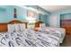 Bedroom with two double beds and light blue walls at 4800 Ocean Blvd. S # 915, North Myrtle Beach, SC 29582
