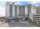 Oceanfront high-rise building with parking and signage at 4800 Ocean Blvd. S # 915, North Myrtle Beach, SC 29582