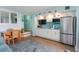 Modern kitchen with white cabinets and granite counters at 4800 Ocean Blvd. S # 915, North Myrtle Beach, SC 29582