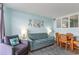 Living area with sofa, chairs, and coastal decor at 4800 Ocean Blvd. S # 915, North Myrtle Beach, SC 29582