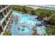 Aerial view of resort pool area with multiple pools and hot tubs at 4800 Ocean Blvd. S # 915, North Myrtle Beach, SC 29582