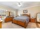 Large main bedroom with wood furniture and ample natural light at 5373 Highway 66, Loris, SC 29569