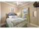 Bedroom with full bed, seashell bedding, and window at 6001 - P-29 S Kings Hwy., Myrtle Beach, SC 29575