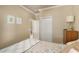 Bedroom with full bed, dresser, and access to bathroom at 6001 - P-29 S Kings Hwy., Myrtle Beach, SC 29575
