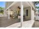 Covered porch with outdoor seating and ceiling fans at 6001 - P-29 S Kings Hwy., Myrtle Beach, SC 29575