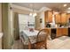 Bright dining area with table and chairs near kitchen at 6001 - P-29 S Kings Hwy., Myrtle Beach, SC 29575