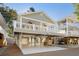 Beach house with parking underneath and covered porch at 6001 - P-29 S Kings Hwy., Myrtle Beach, SC 29575