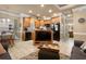 Open kitchen with light wood cabinets, breakfast bar, and black appliances at 6001 - P-29 S Kings Hwy., Myrtle Beach, SC 29575