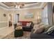 Cozy living room featuring a comfy sofa and a charming coastal-themed artwork at 6001 - P-29 S Kings Hwy., Myrtle Beach, SC 29575