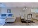 Light and airy dining area with glass table and seating for four at 601 Hillside Dr. N # 3805, North Myrtle Beach, SC 29582